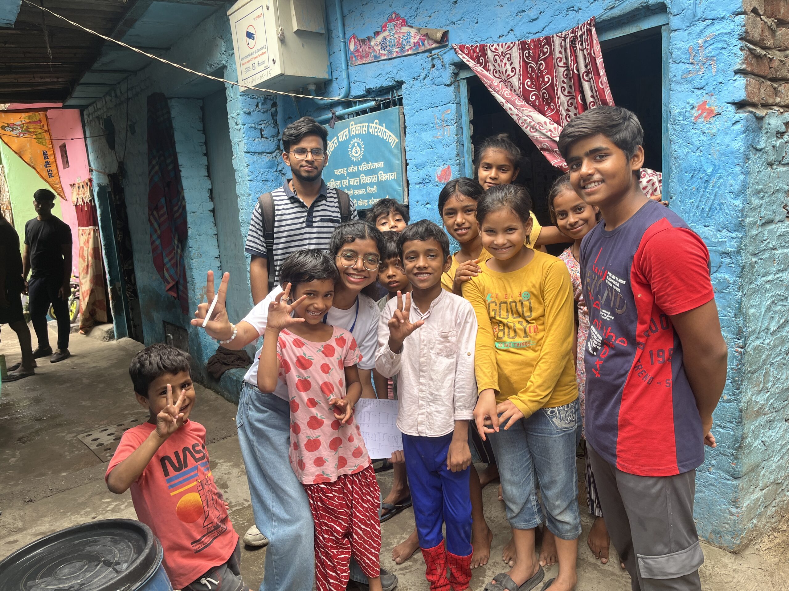 NGO volunteers conducting door-to-door awareness and data collection survey