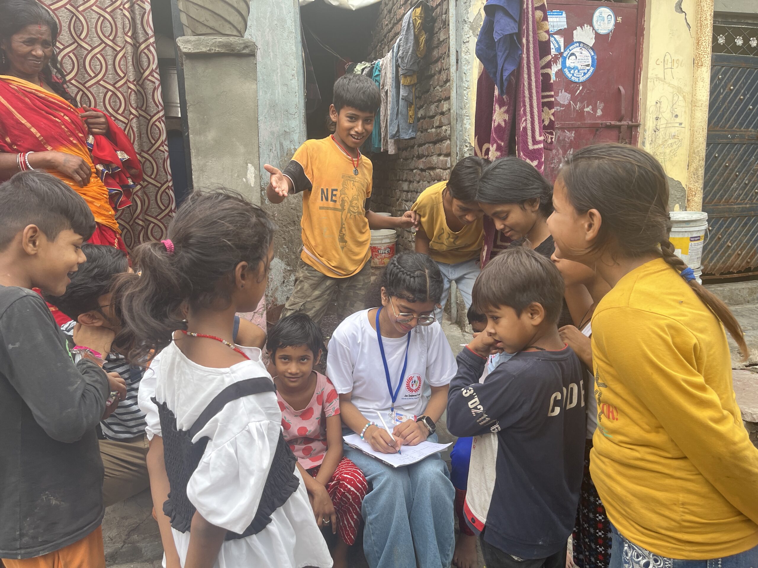 NGO volunteers conducting door-to-door awareness and data collection survey