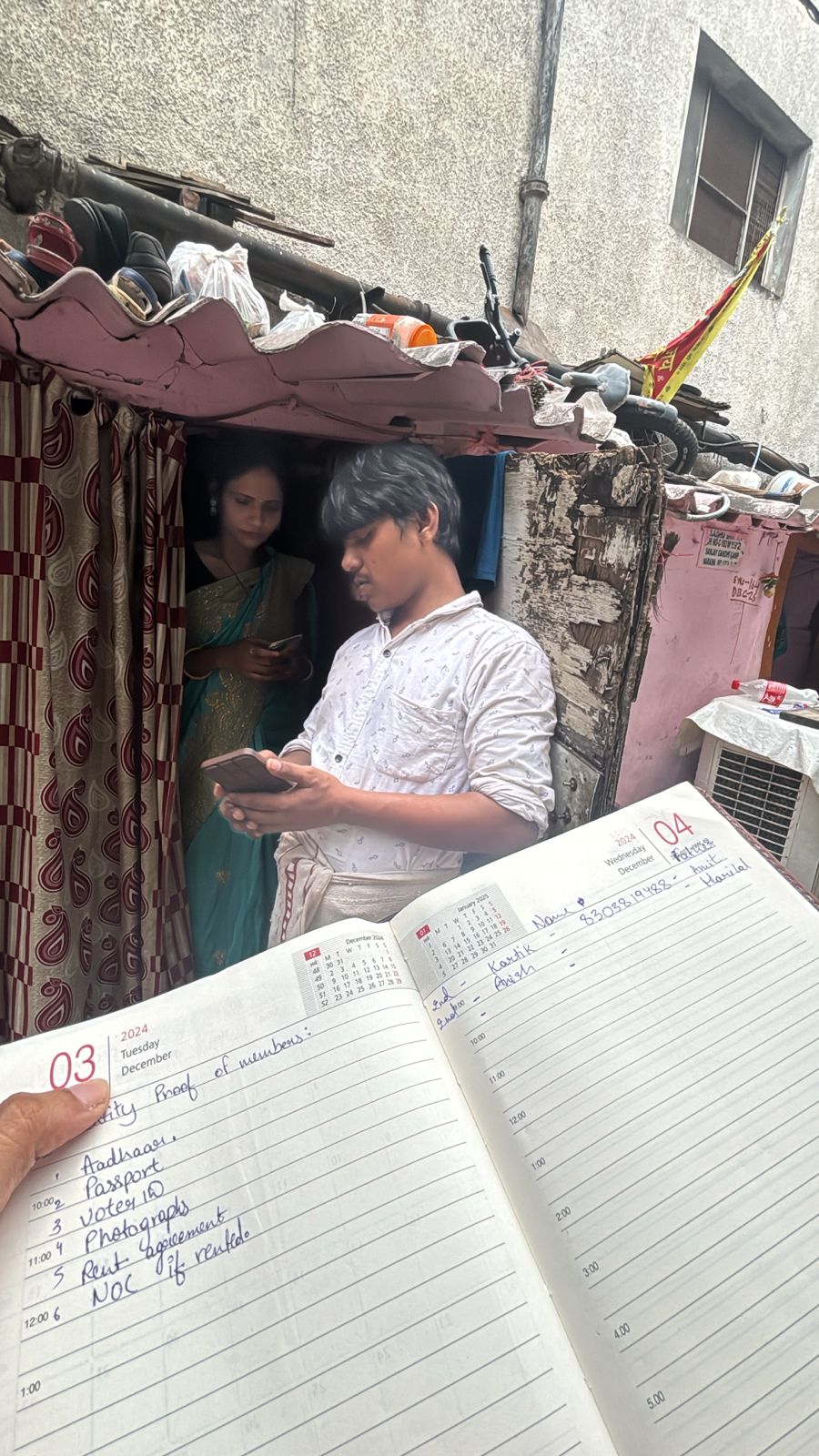 NGO volunteers conducting door-to-door awareness and data collection survey