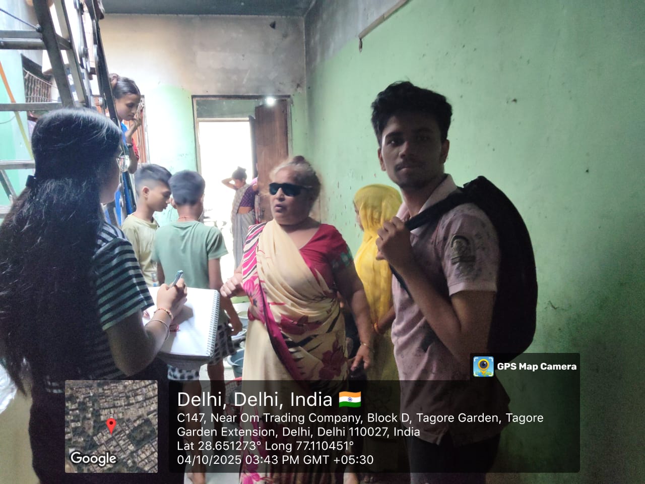 NGO volunteers conducting door-to-door awareness and data collection survey