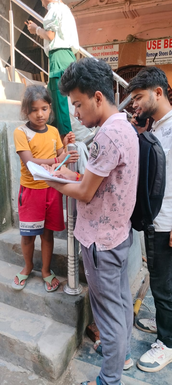 NGO volunteers conducting door-to-door awareness and data collection survey